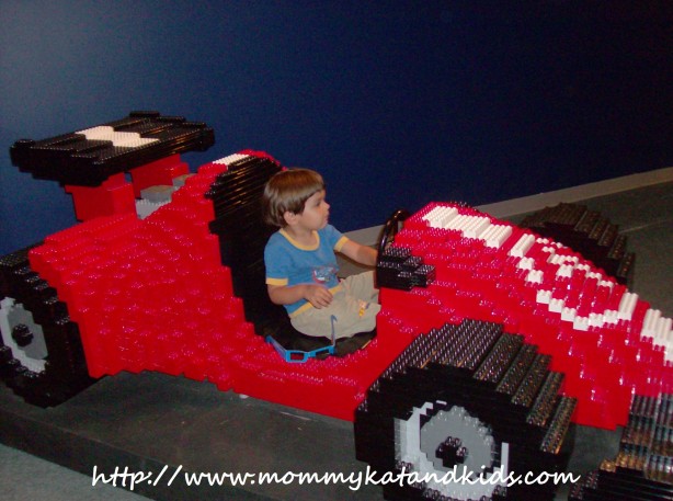 Boy in Lego race car