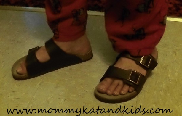 husband wearing viking sandals