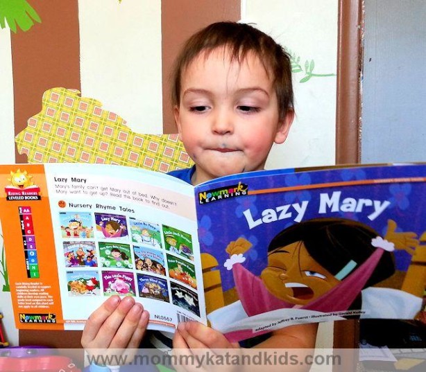 boy reading newmark learning book