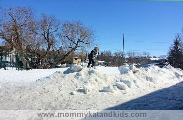 boy playing in snow saskatchewan