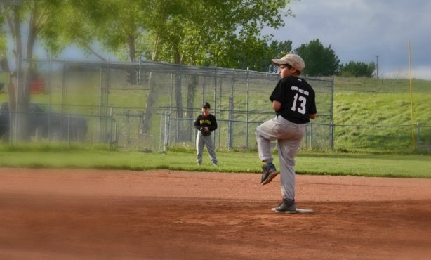 zack boy pitching baseball