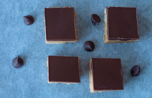 peanut-butter-squares-on-parchment-paper