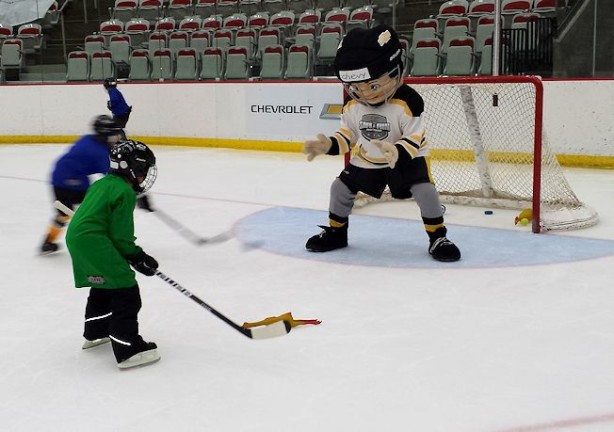boy playing hockey chevy canada