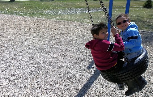 boys on swing