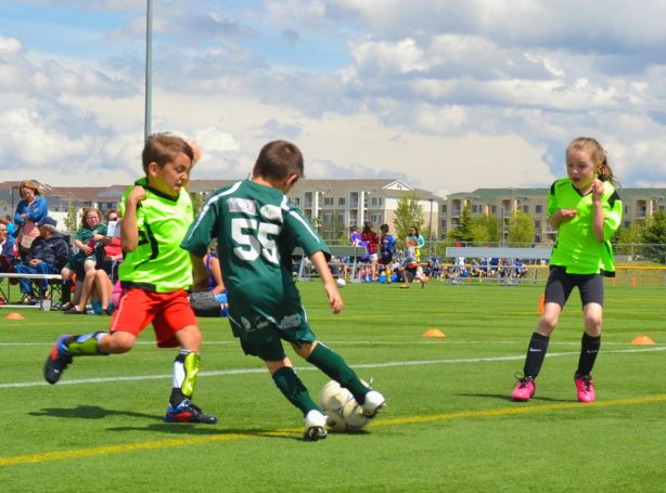 boys playing soccer