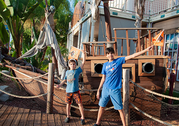 boys-in-front-of-pirate-ship