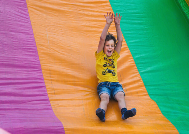 boy-on-inflatable-slide