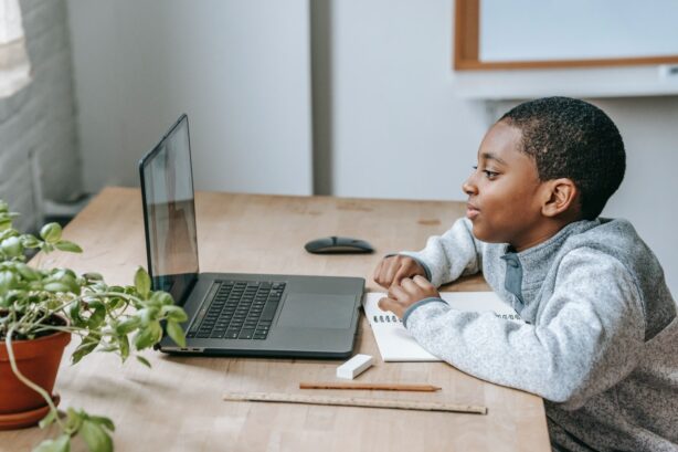 boy sitting at computer