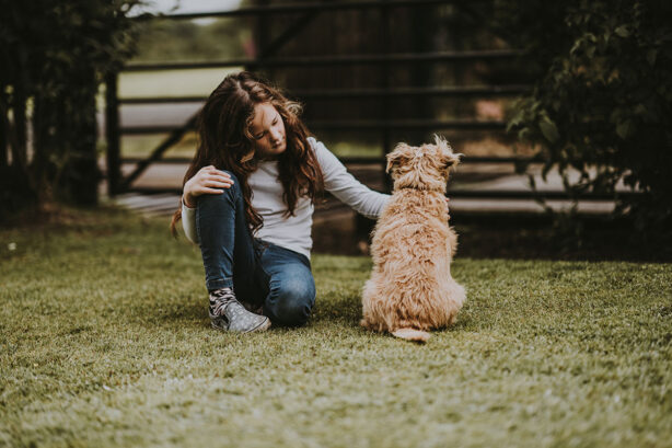 girl-petting-dog