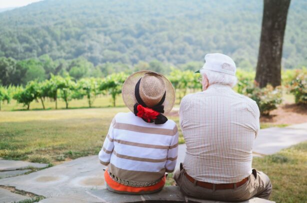 senior couple sitting outdoors