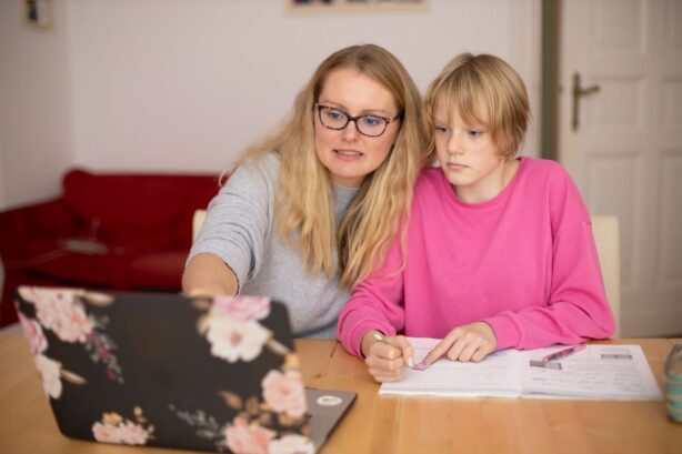 woman and son at computer