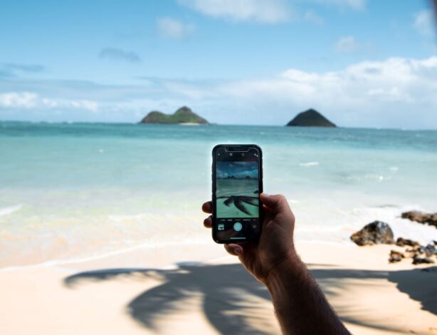 smartphone filming beach