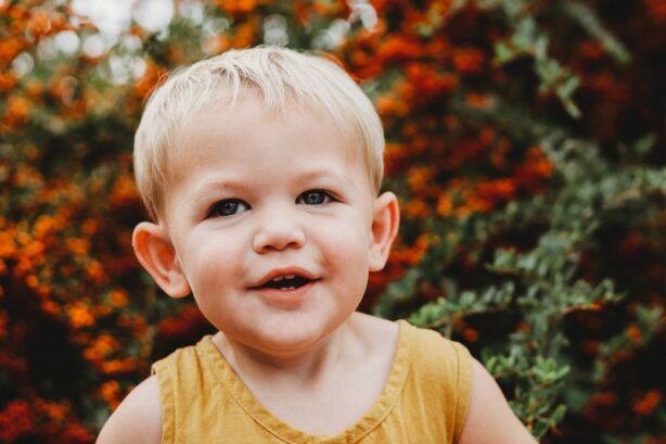 child smiling and showing teeth