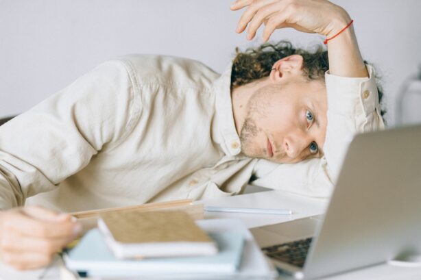 tired man at computer