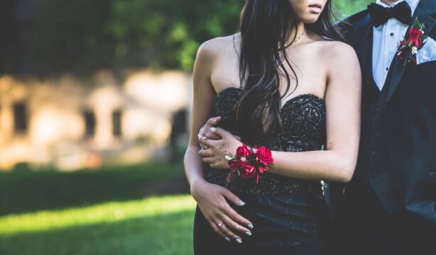 woman in black prom dress