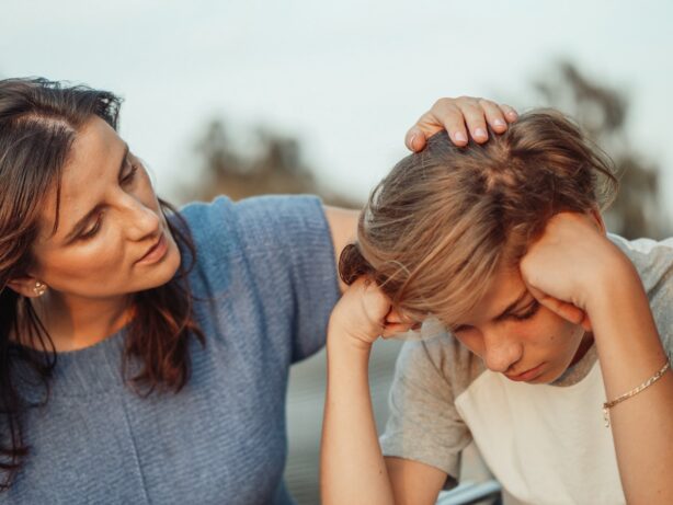 mom comforting child