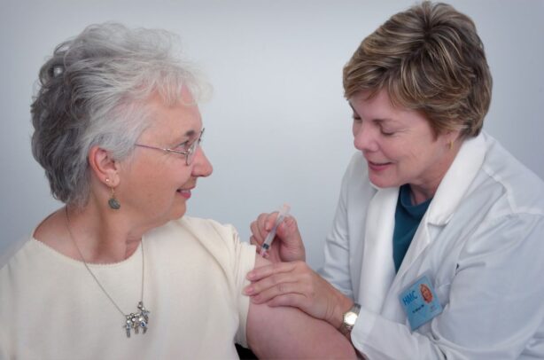 senior woman receiving injection