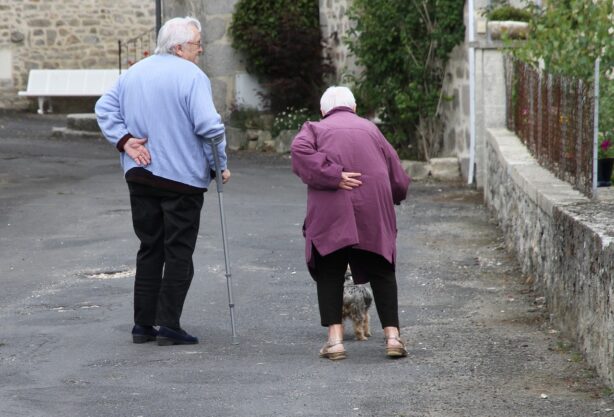 elderly couple walking