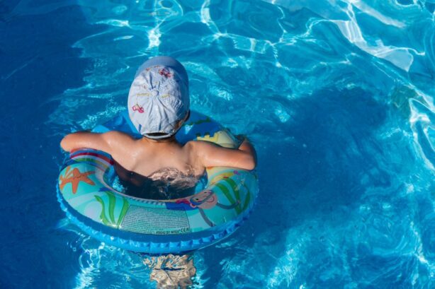 boy swimming in water