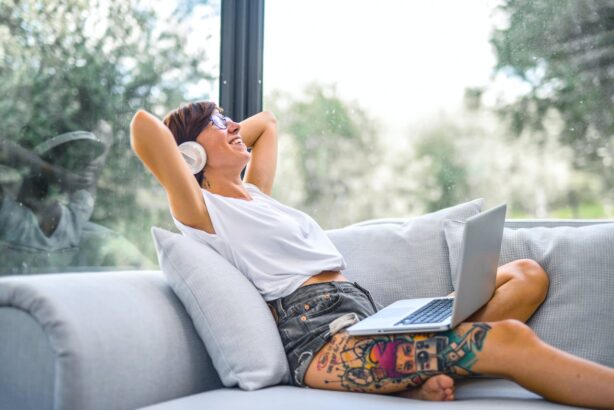 woman working on couch