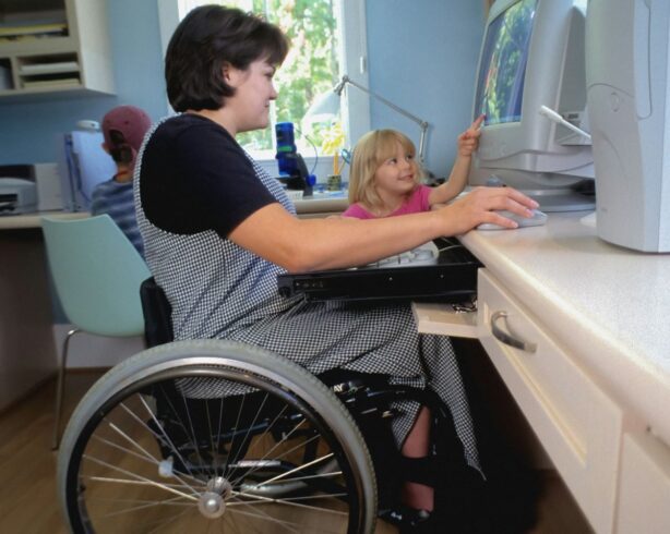 mom in wheelchair with child