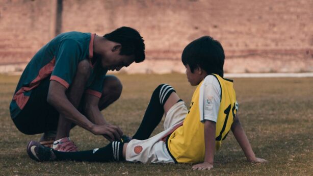 boy getting injury treated