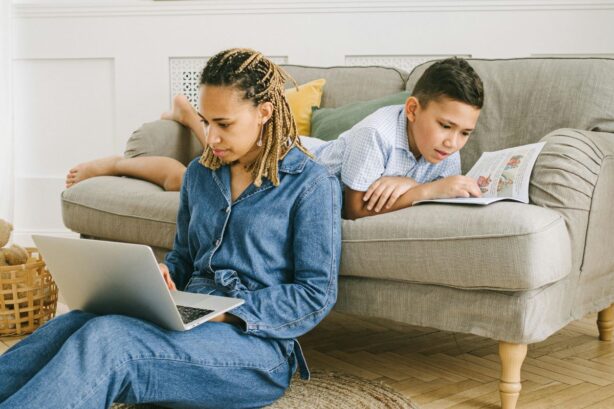 woman studying with son