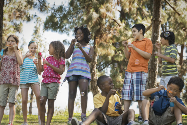 children playing outdoors in summer